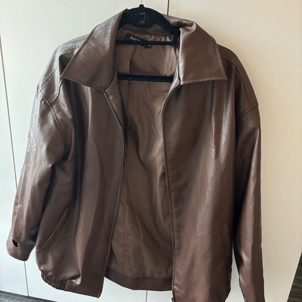 Oversized brown leather jacket